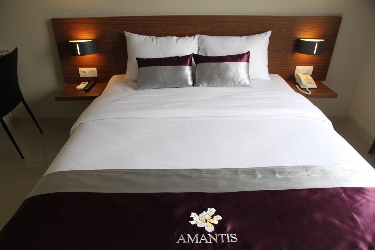 Amantis Hotel Demak Kamer foto