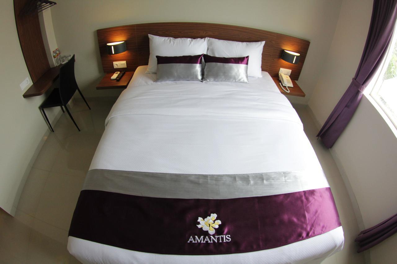Amantis Hotel Demak Kamer foto
