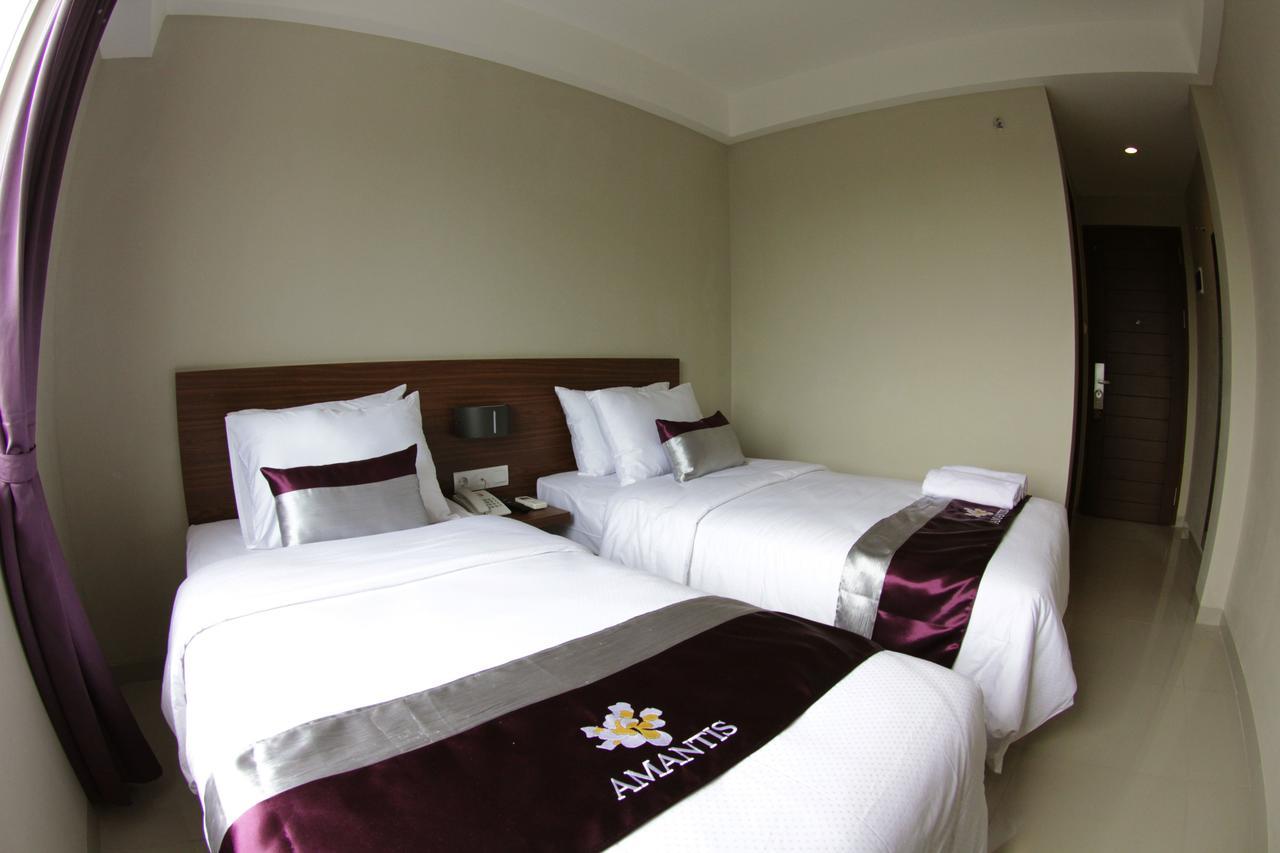 Amantis Hotel Demak Kamer foto